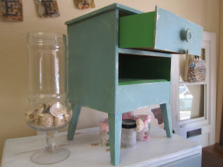 side table with provence paint and in the side of the drawer it has antibes color paint