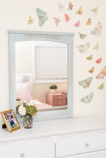 The finishing touches are found in a variety of thrift store picture frames, lamps, mirrors and my favorite part…springtime butterflies. The paper butterflies scattered across the opposite wall of Mila’s bed pull together all of the color choices so that the space is balanced and cohesive!